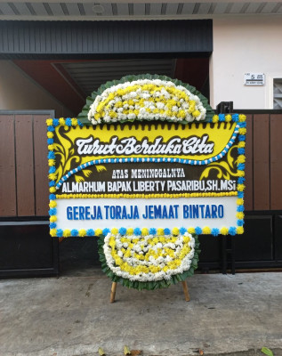 Papan Bunga Duka di Suka Damai